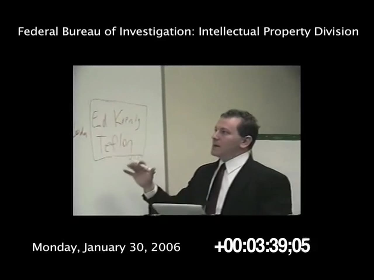 Episode 17 — an FBI briefing room, a whiteboard with "Ed Koenig / Teflon" boxed, captioned Monday, January 30, 2006